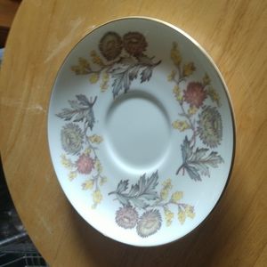 7 bone china saucers